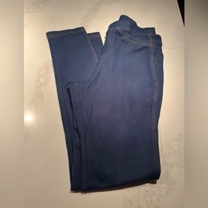 NWT medium blue denim color jeggings. Elastic waist, Back pockets. Size small.